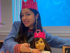 Pictured: Olivia Rodrigo next to a Grace american girl doll